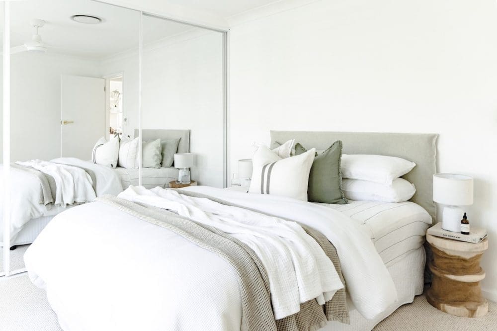 Guest bedroom with green accents