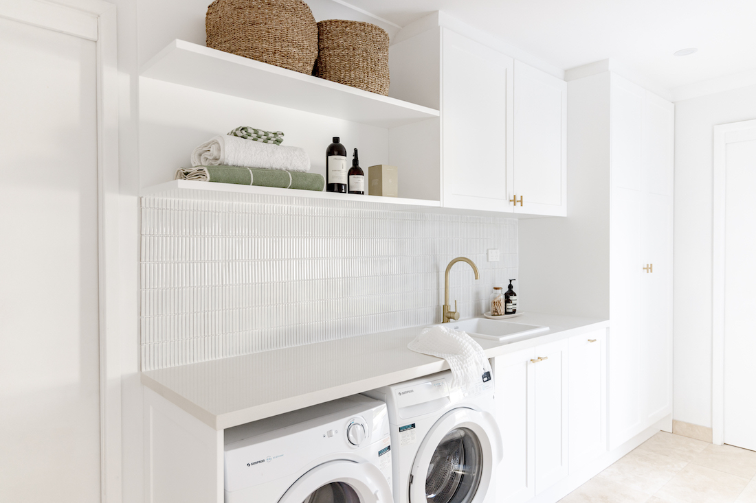 Laundry with gold accents in coastal style