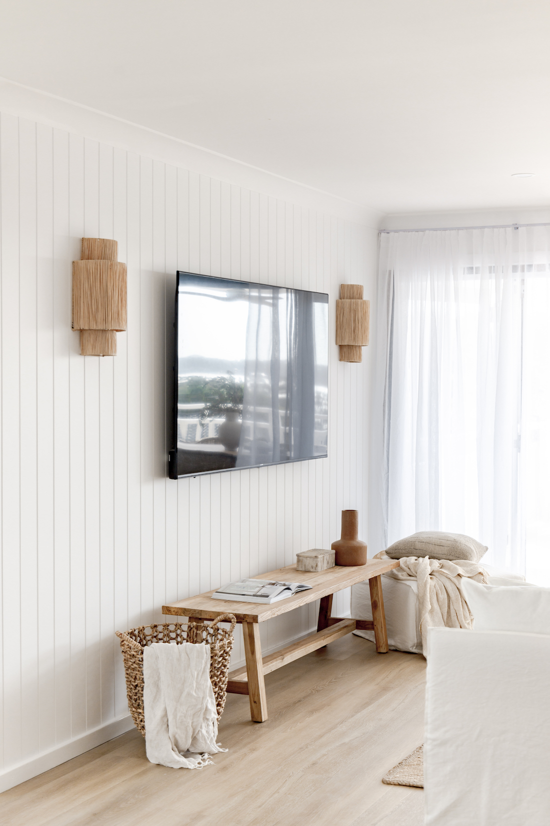 Coastal wall sconces in living room