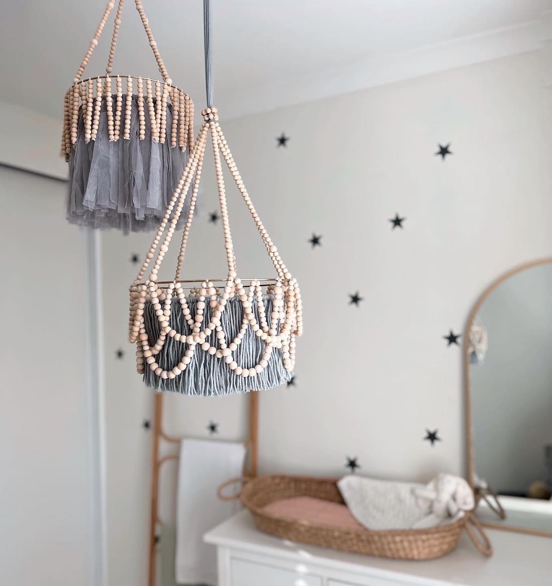 Handmade timber and tassel chandeliers in gender neutral nursery