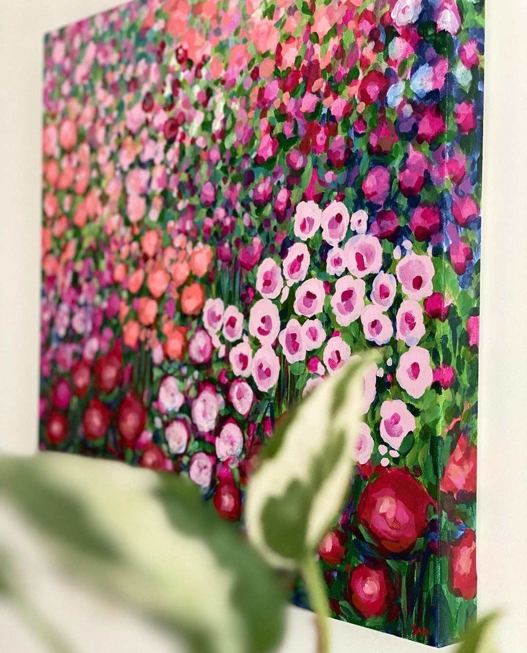 Red and pink floral artwork by Sam Matthews