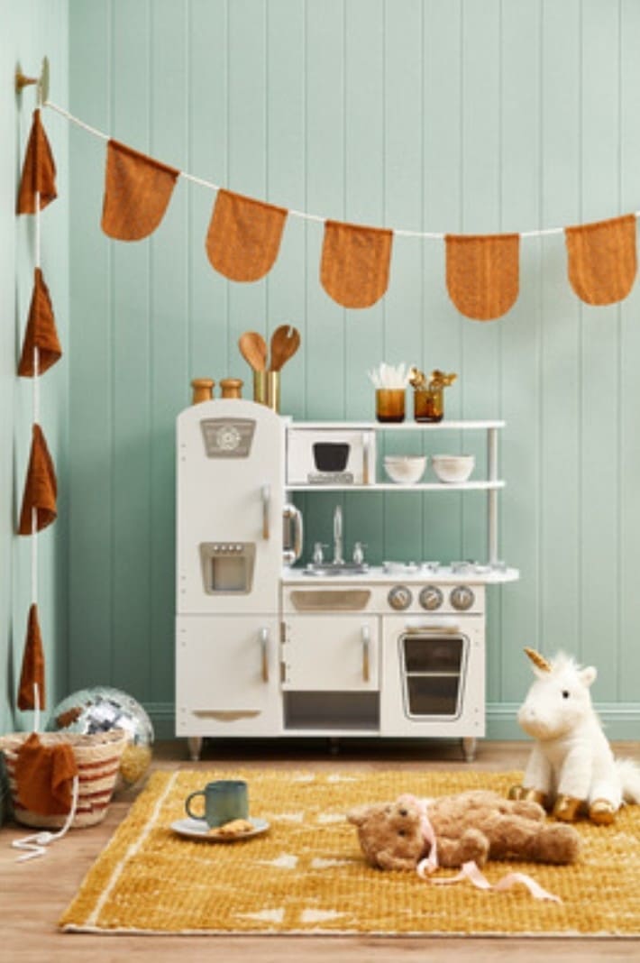 Kids play room with mustard rug