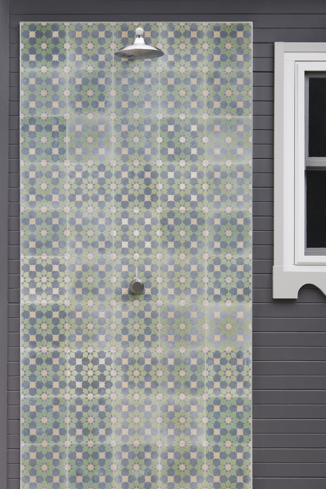 Patterned tiled outdoor shower by The Stylesmiths