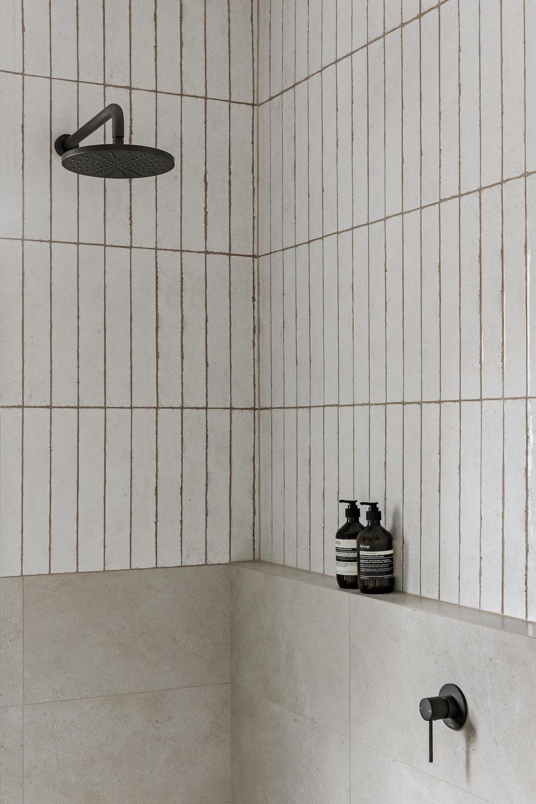 Organic shaped white tiles in bathroom