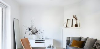 white living room with white fireplace