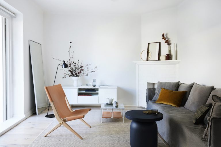 white living room with white fireplace