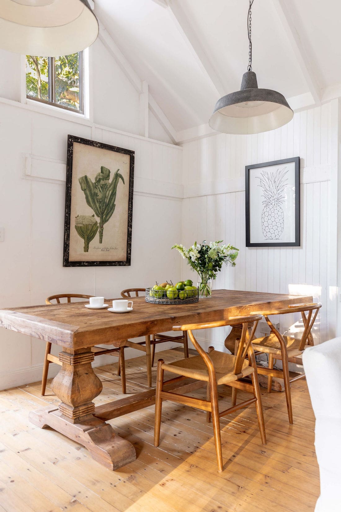 Dining room with cathedral ceilings at Fig Tree Villa Byron Bay