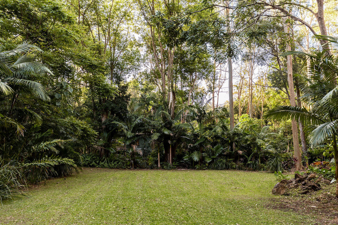 Lush tropical gardens surrounding Fig Tree Villa Byron Bay