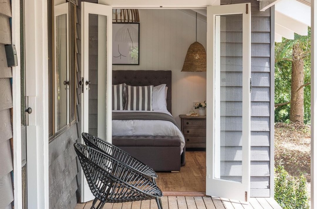Verandah with french doors to bedroom at Fig Tree Villa Byron Bay
