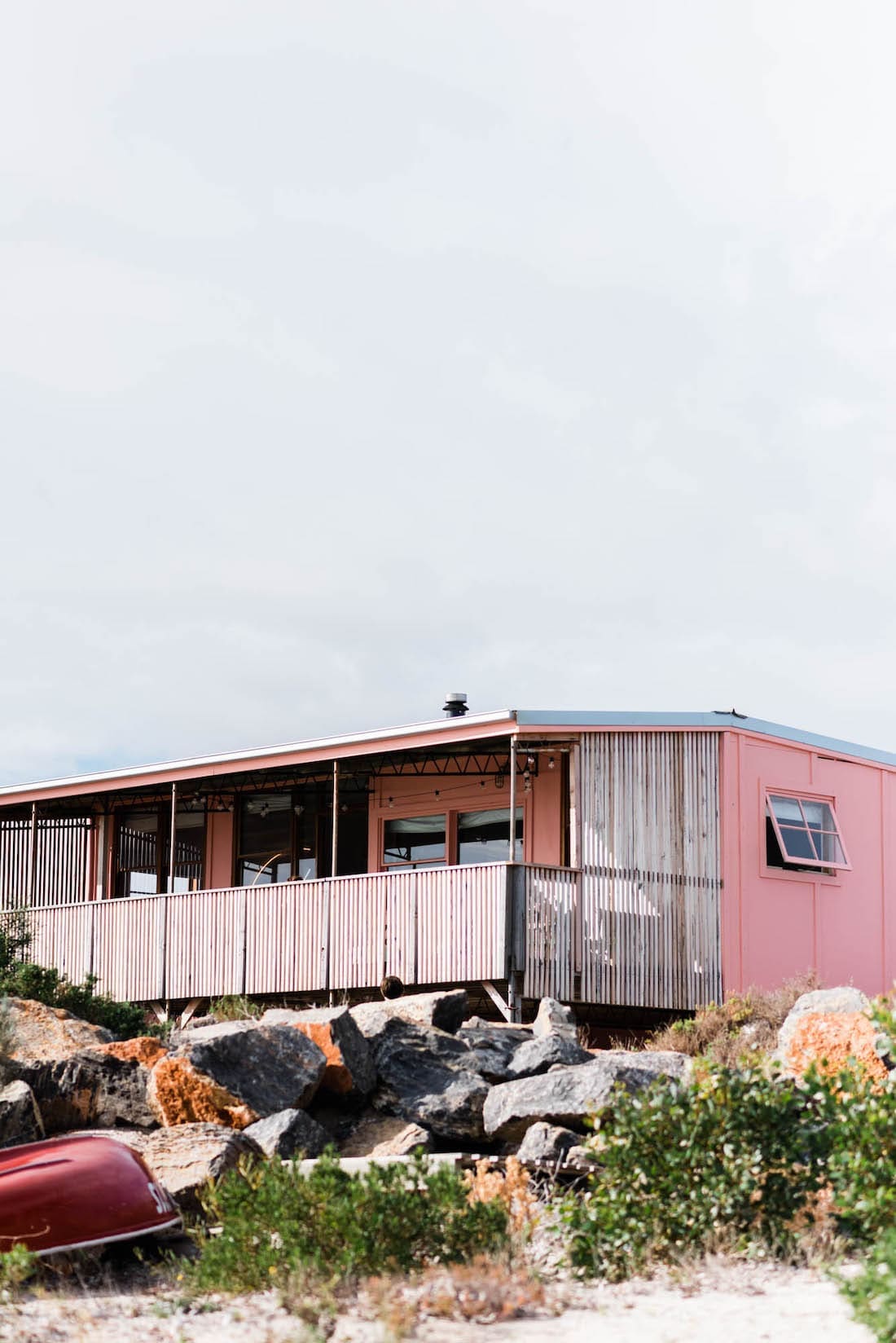 pink coastal home _ pink coastal cabin