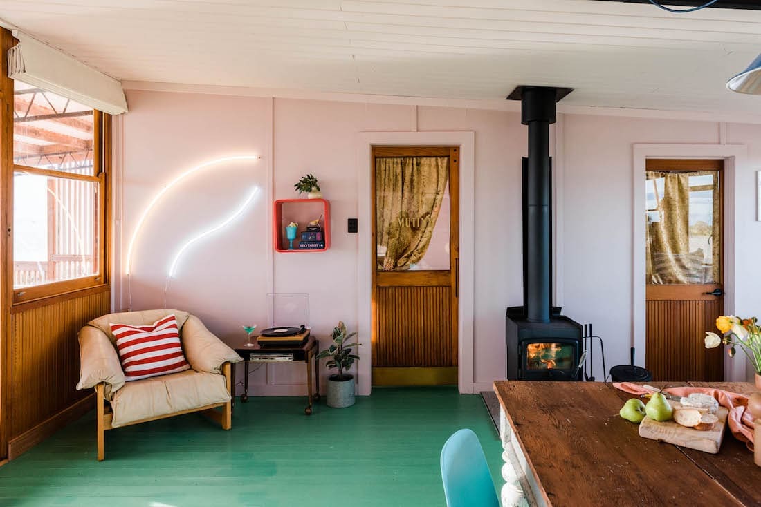 pink living room with green floors