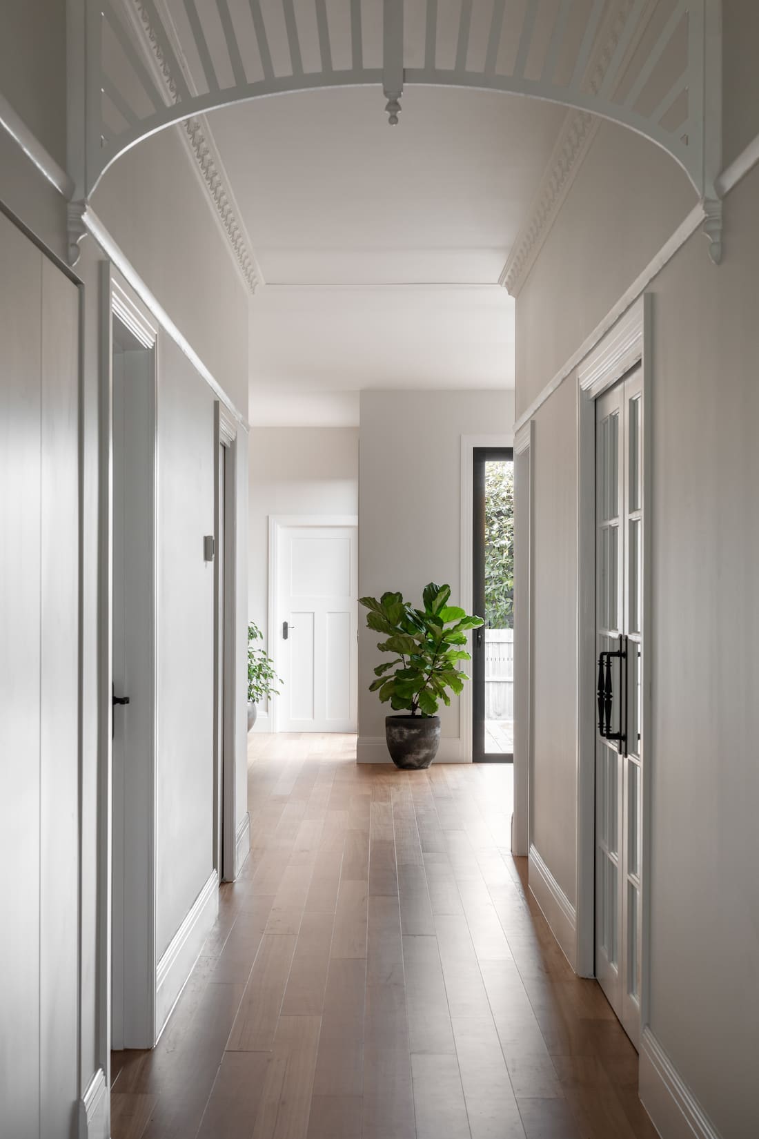 Arch hallway _ contemporary Californian Bungalow renovation