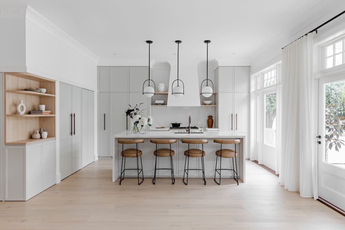 Kitchen with open pocket door shelving