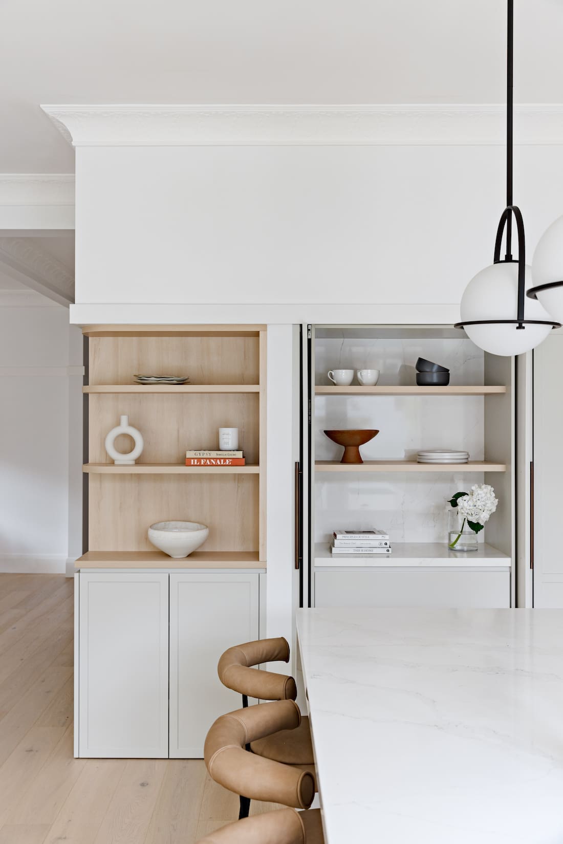 Shelves and pocket doors shown behind pocket doors