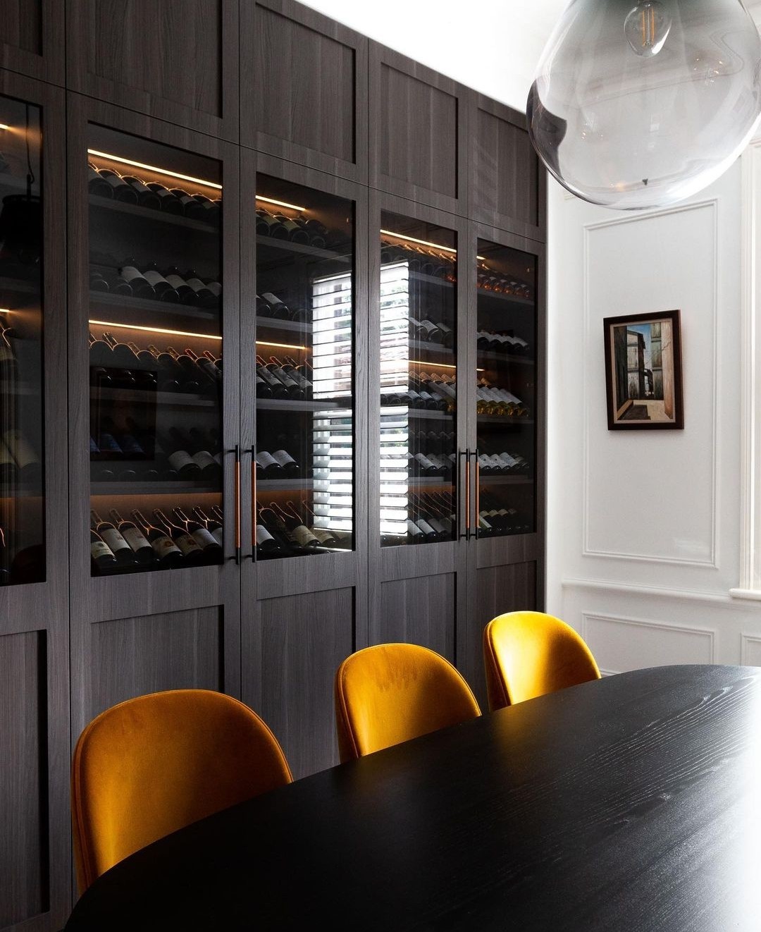 Wine room feature wall in dining space