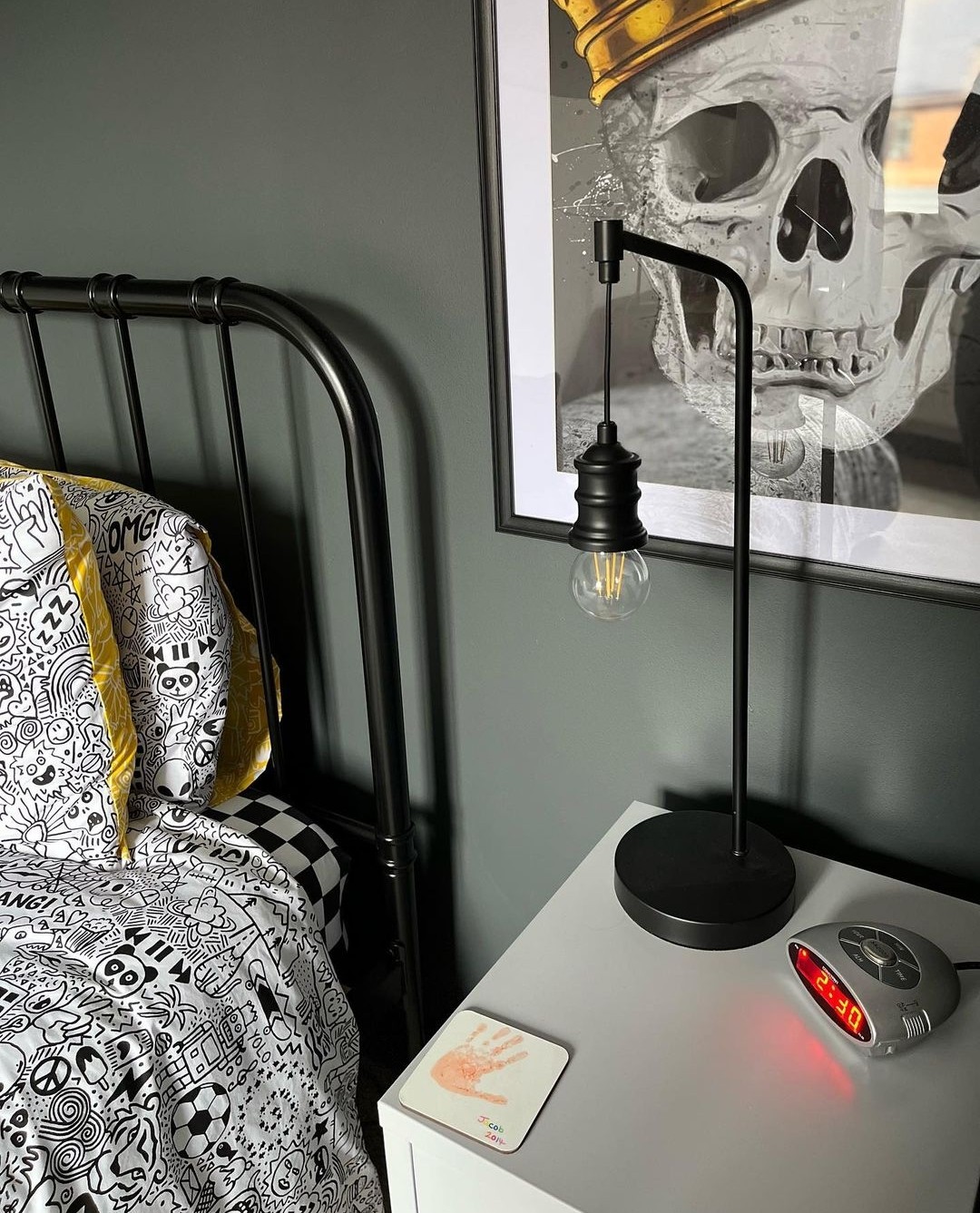 Monochrome bedroom with skull art