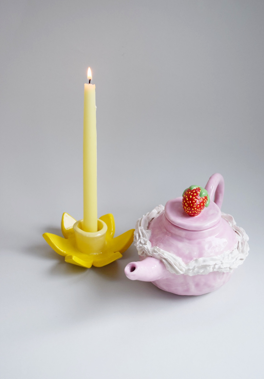 Daffodil candle holder and strawberries and cream tea pot from Kiwi Poca