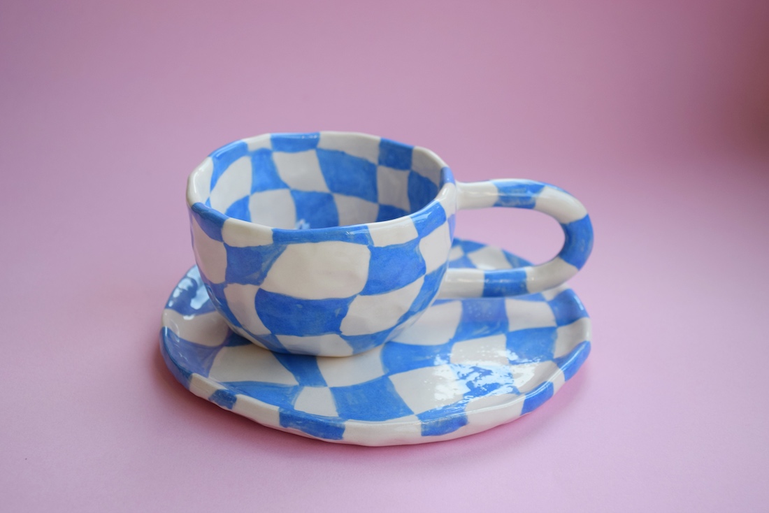 Blue and white checked cup and saucer set from Kiwi Poca