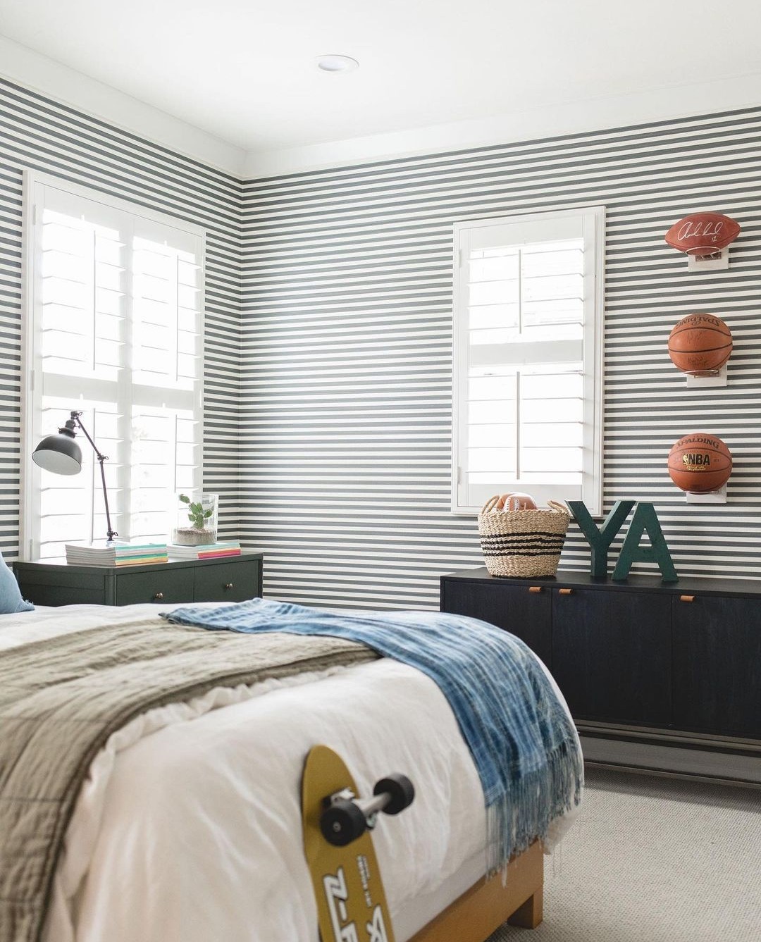Striped wallpaper and ball shelves