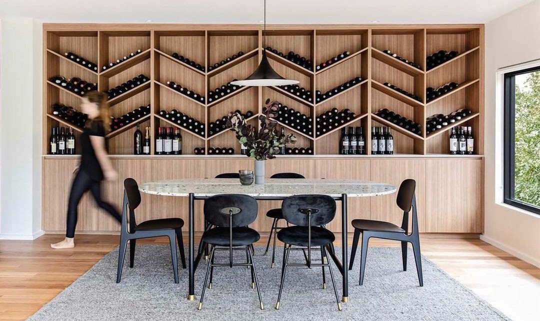 Dining room with wine feature wall