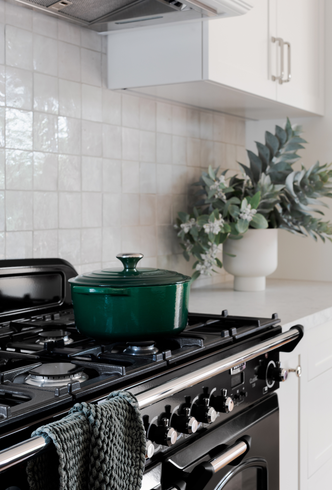 black oven with green dutch oven _ contemporary Californian Bungalow renovation