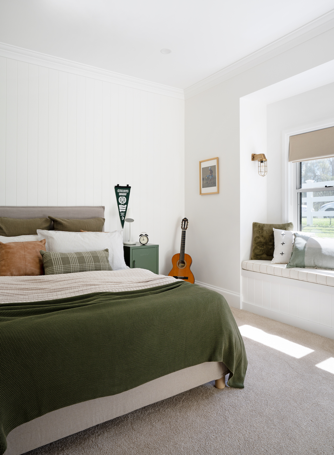 Front Porch Brookfield home - bedroom with green bedding