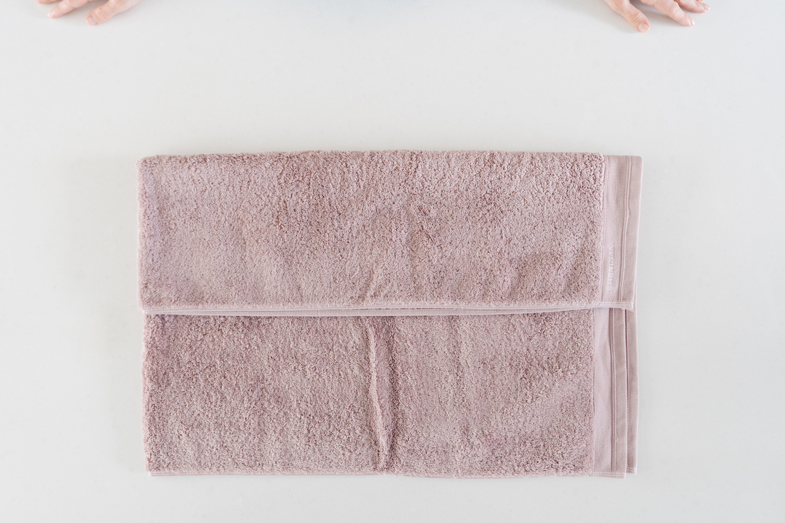 Fold towel in thirds