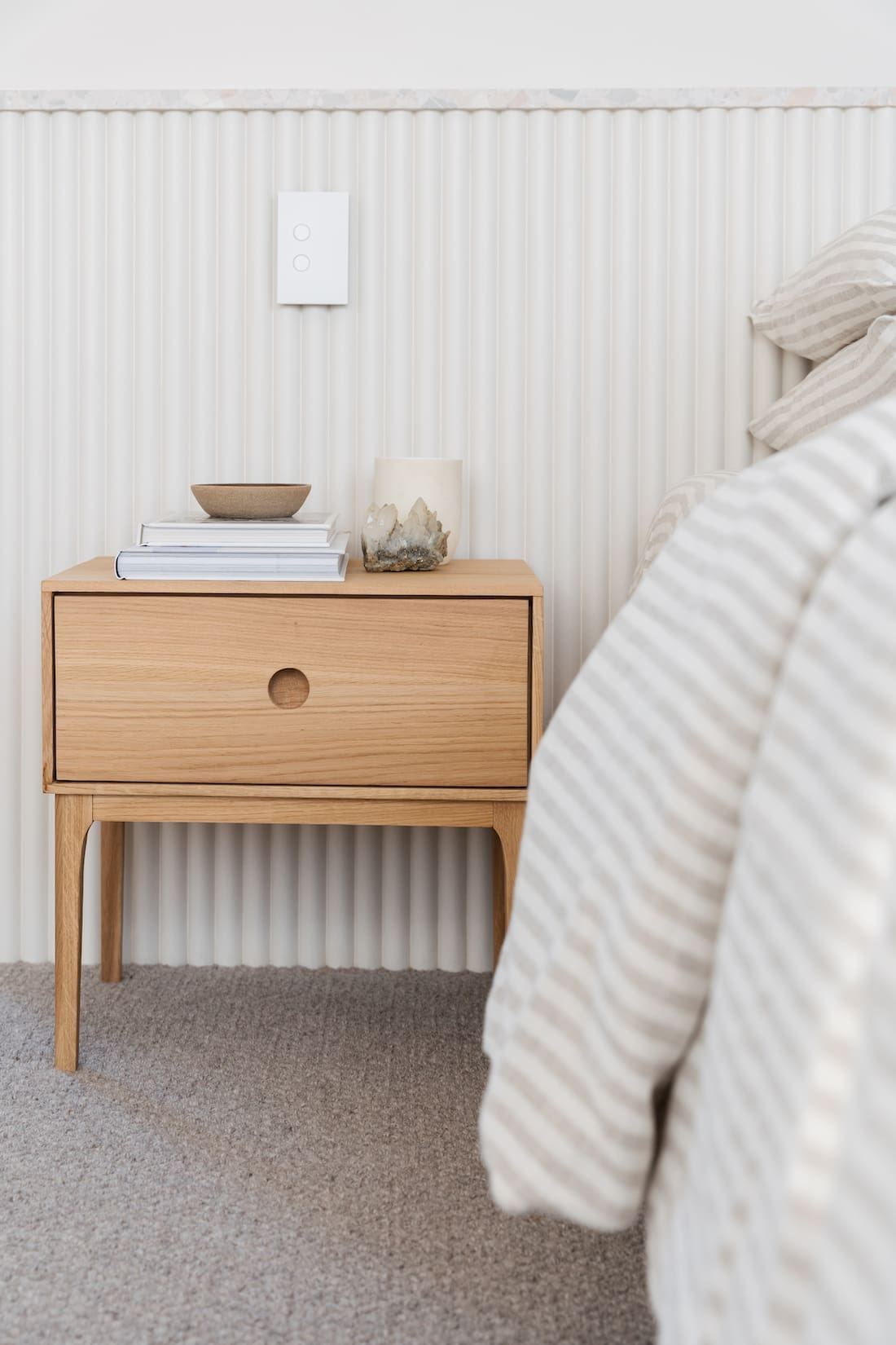 Fluted bedroom wall