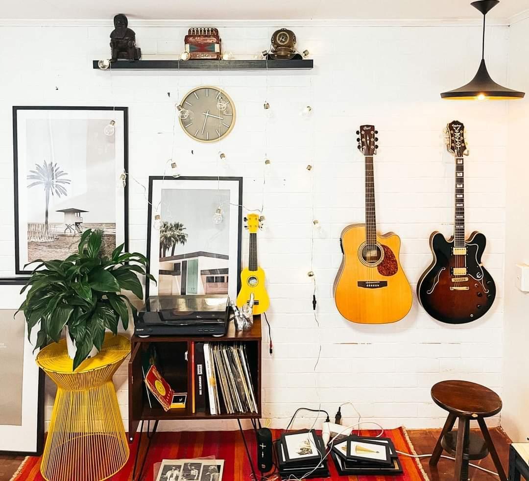 Man cave with guitars on wall