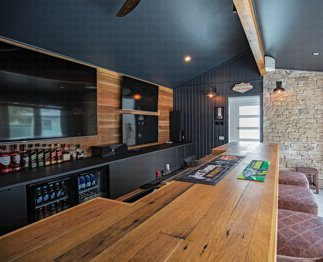 Timber bar and black roof in man cave