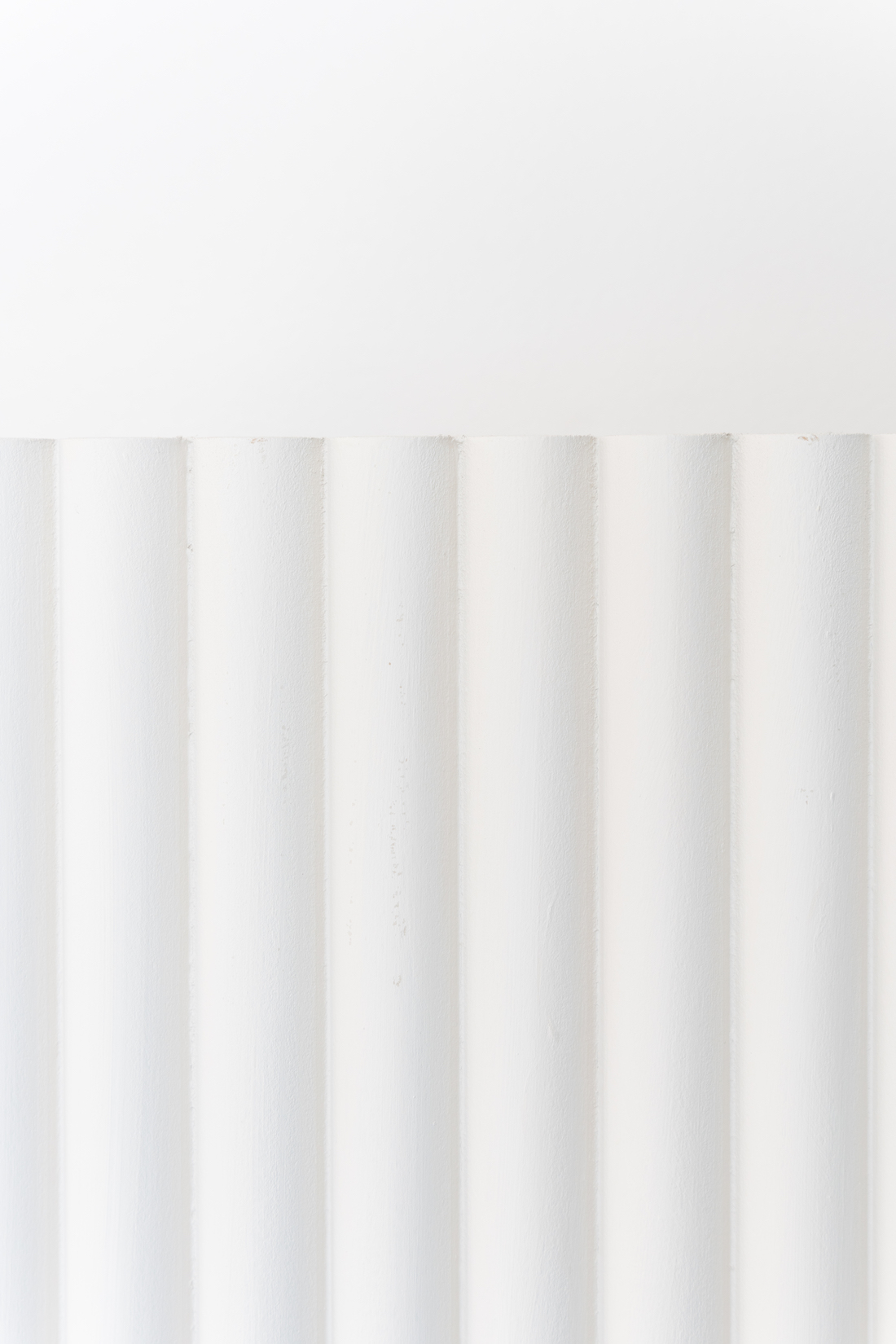 white fluted wall ledge