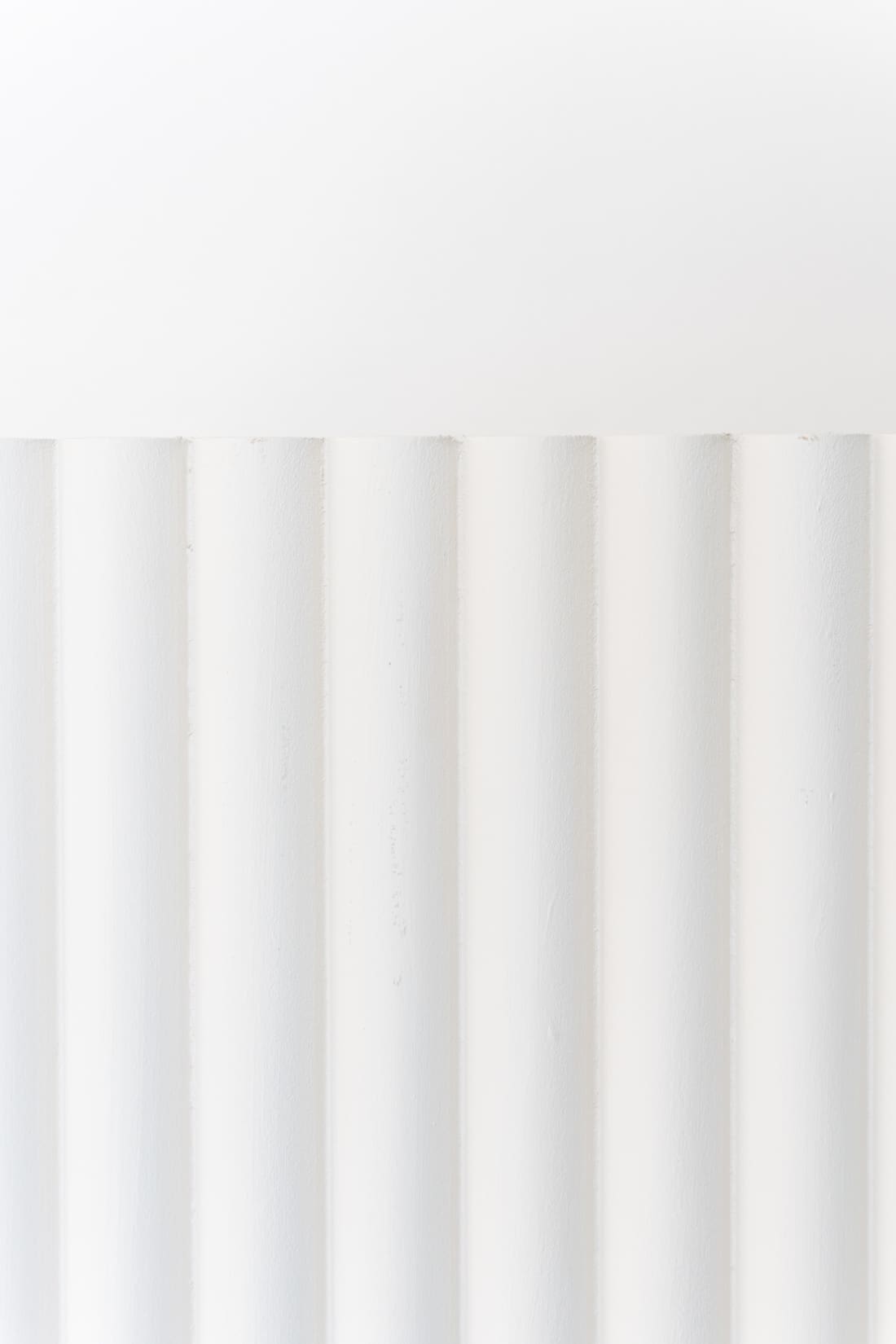 white fluted wall ledge