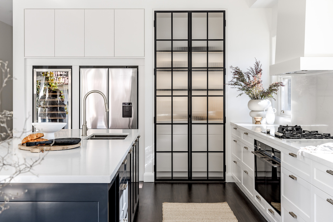 Fluted glass pantry door with black frame