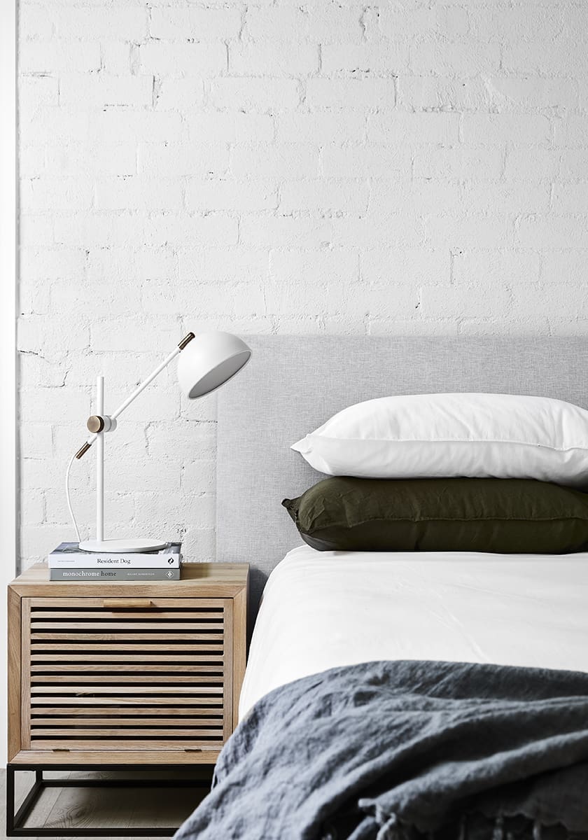 exposed brick bedroom wall