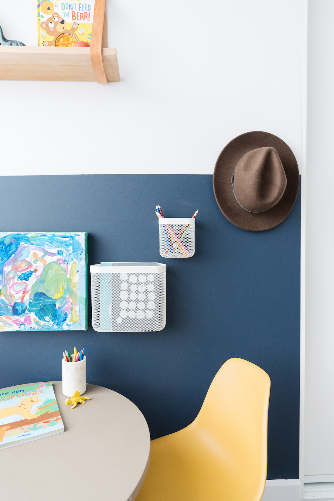 Navy blue wall in kids craft area