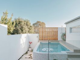 Blush mosaic pool with curved edge