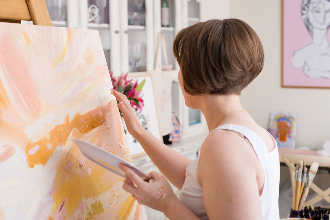 Claire Devine painting vibrant Australian artworks