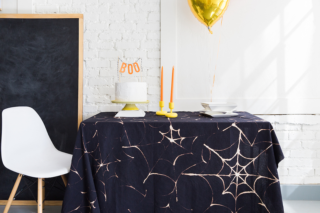 spiderweb tablecloth _ Halloween home styling guide
