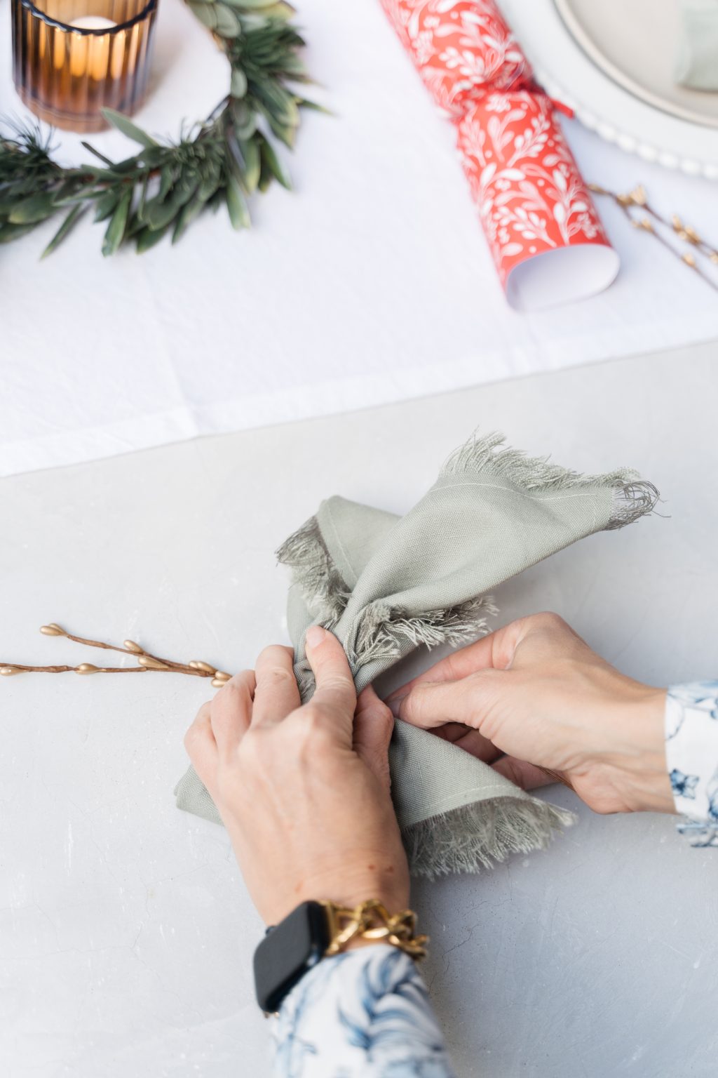 Christmas Napkin Folding Technique Fold Your Napkins Into A Bow   Christmas Bow Napkin Folding 1024x1536 