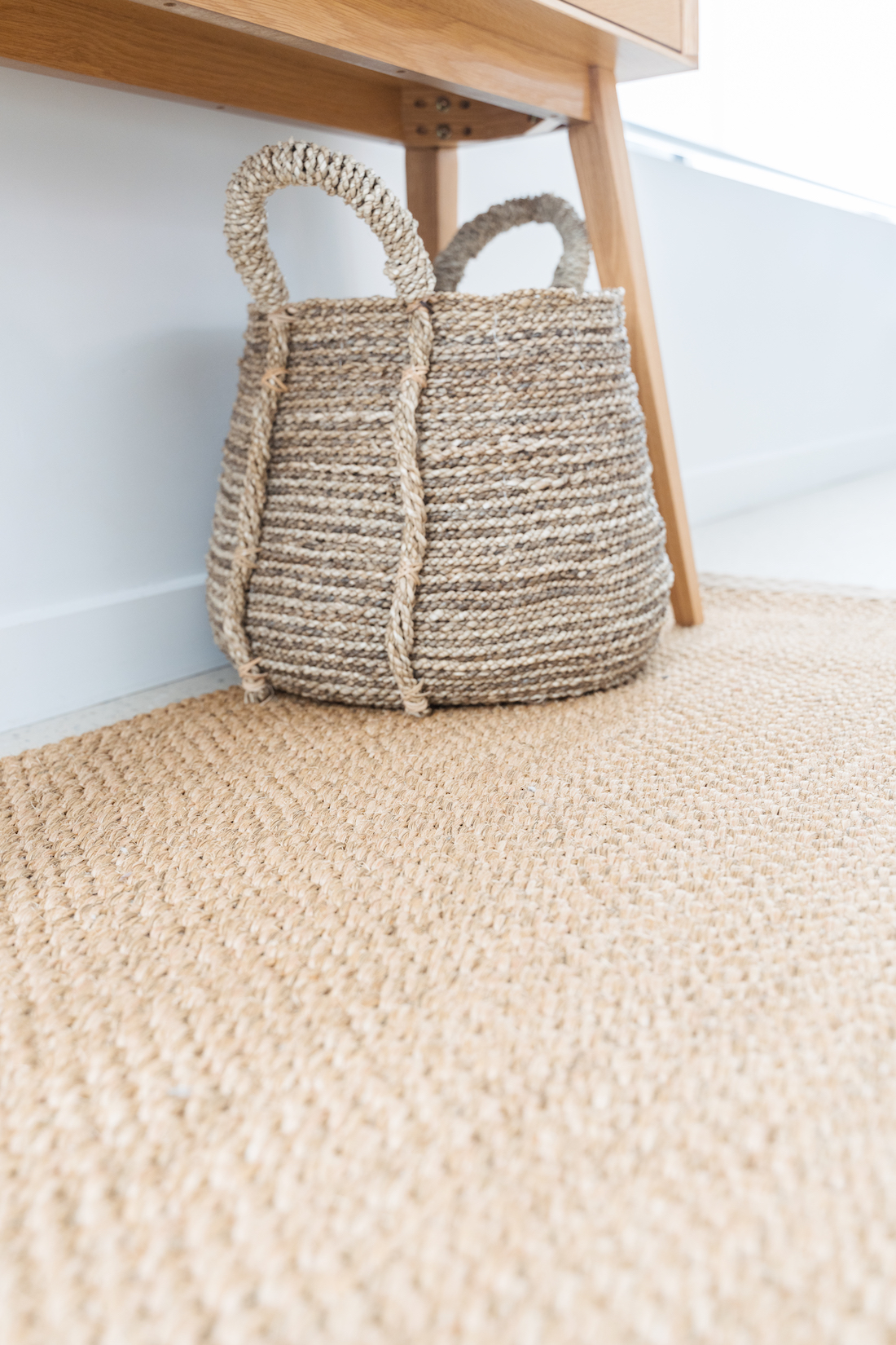 Jute rug and woven basket