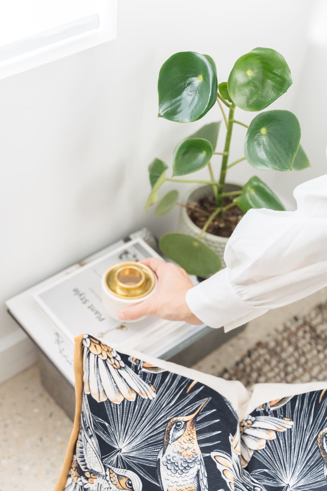 Plants and oil burner add to the relaxing ambience