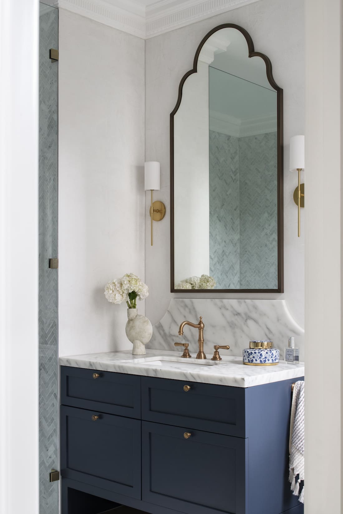 Transcontinental Residence blue vanity in bathroom