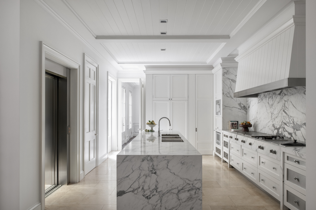 Transcontinental Residence marble and white kitchen