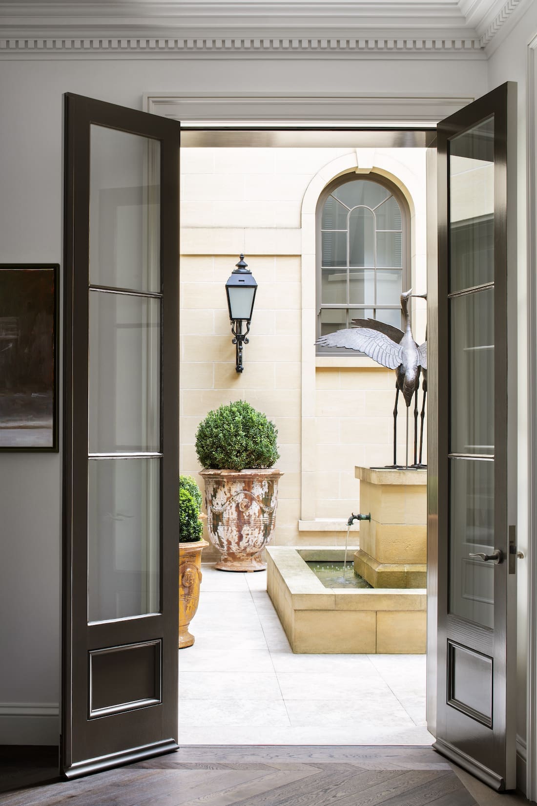 Transcontinental Residence courtyard with outdoor fountain