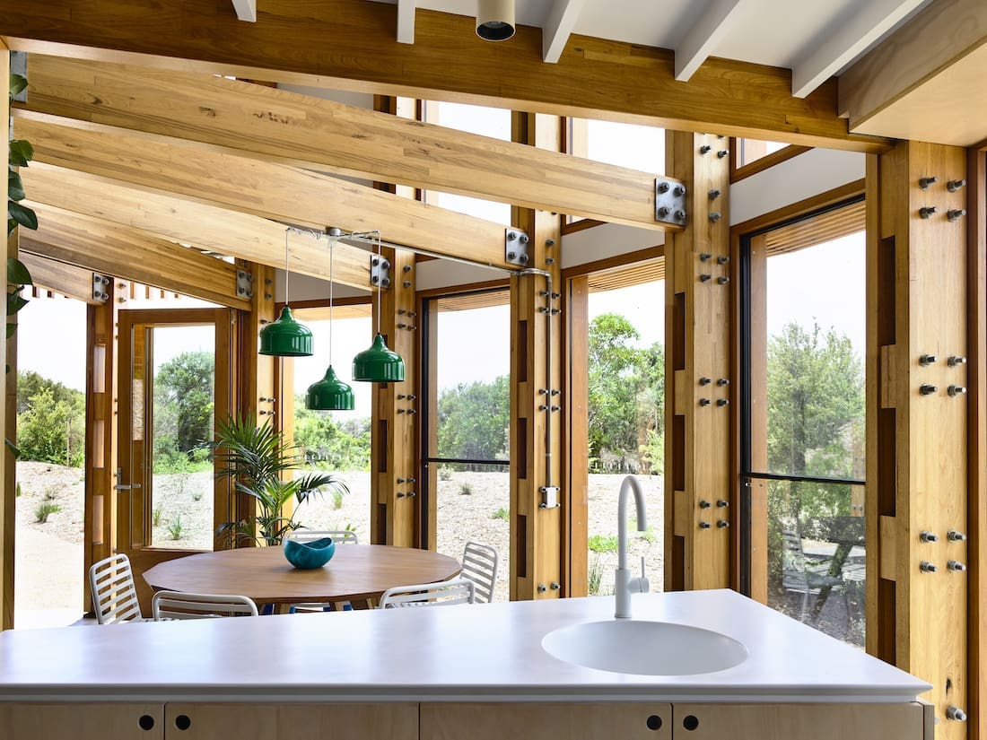 White kitchen bench and sink in round home