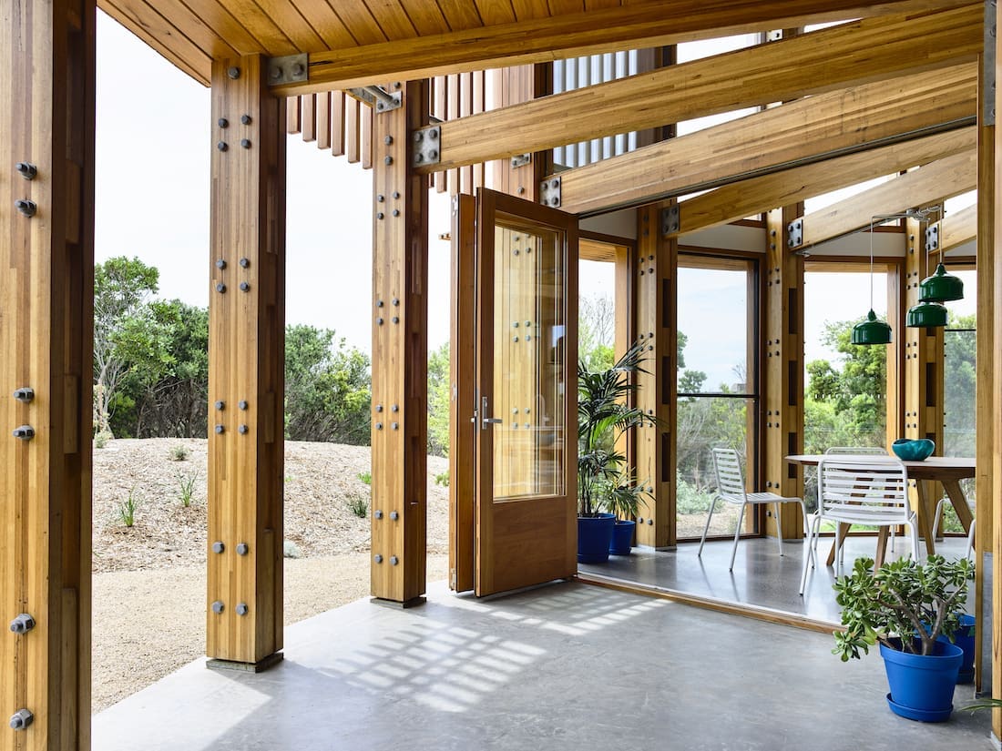 Exposed timber beams and posts in round house