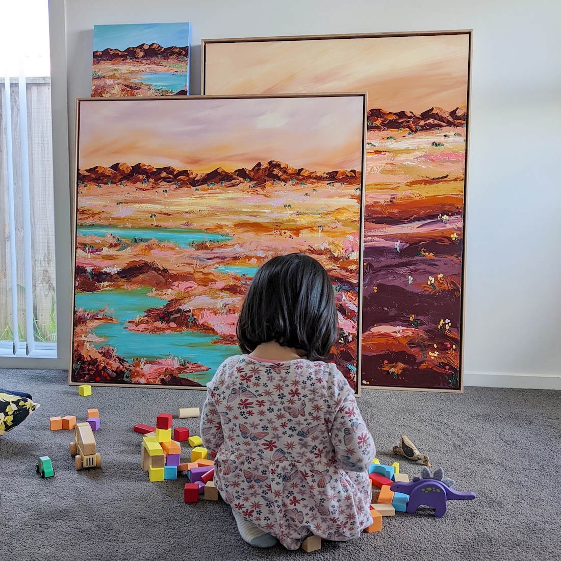 Elle Pervez daughter with paintings