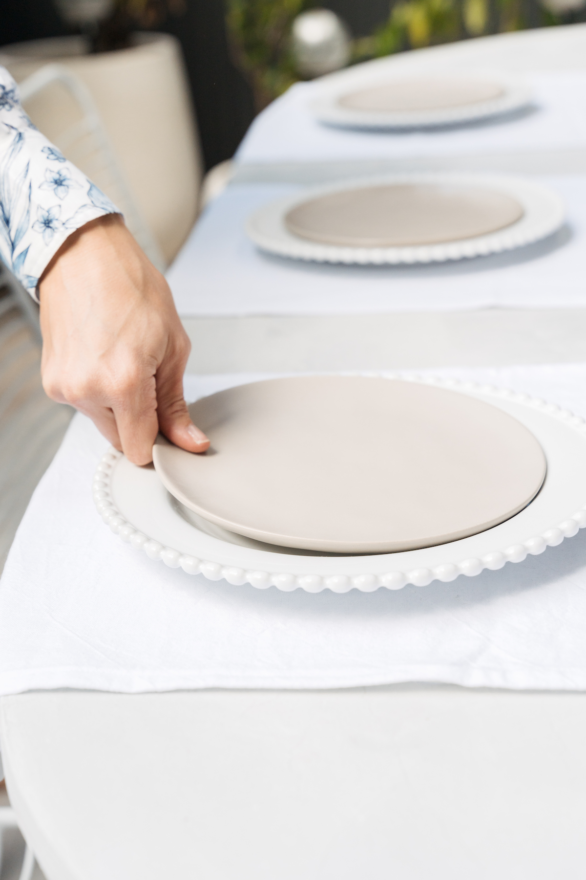 Layer a side plate on top of a dinner plate