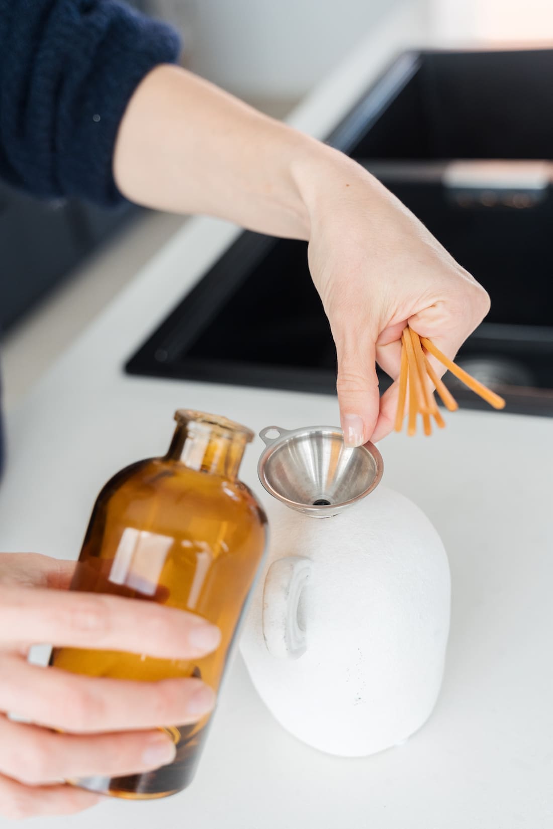 Use a funnel to easily transfer diffuser liquid