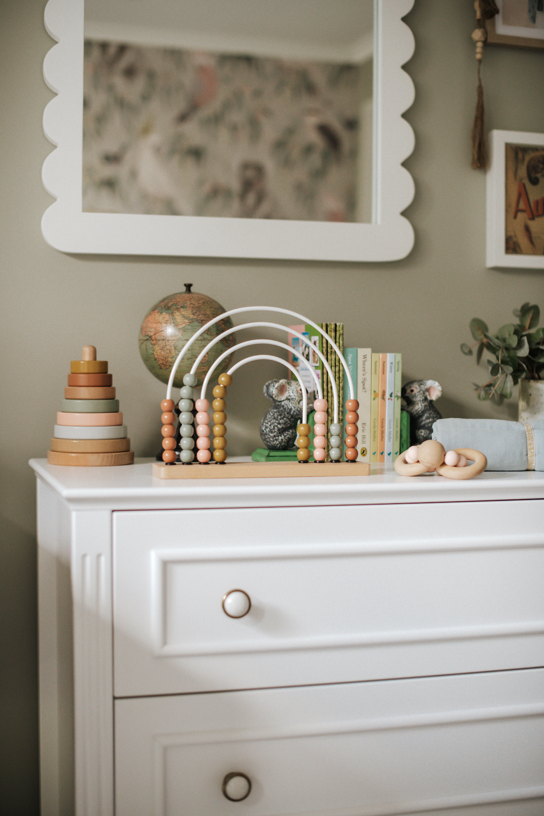 Styling a chest of drawers in baby nursery